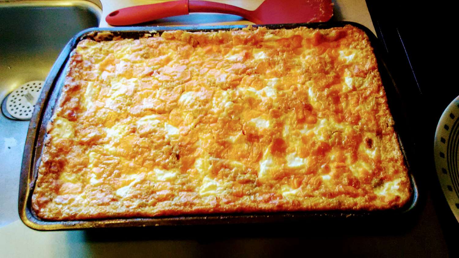 Cheesy Corn Casserole with Roasted Chiles and Pimentos