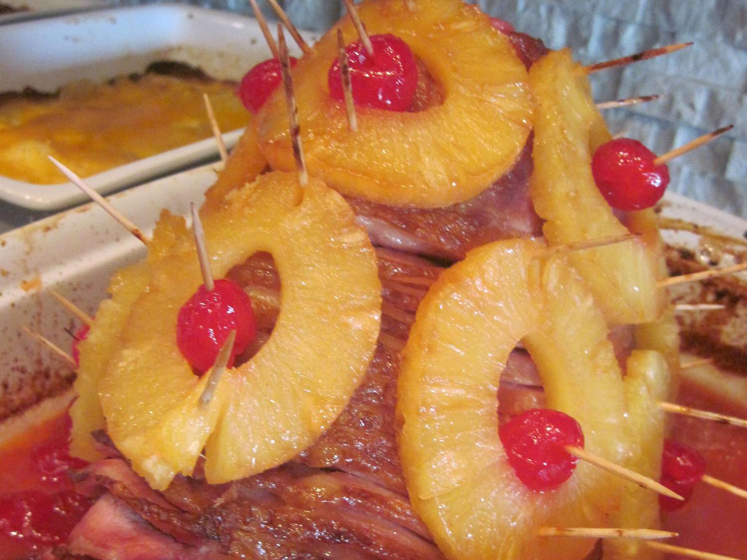 Oven-Baked Ham with Pineapple Mustard Glaze and Cherries