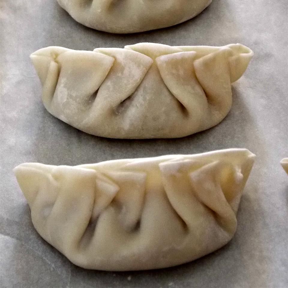 Pork Dumplings with Dandelion Greens