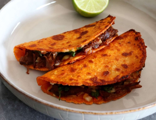 Beef Birria Queso Tacos with Rich Consommé