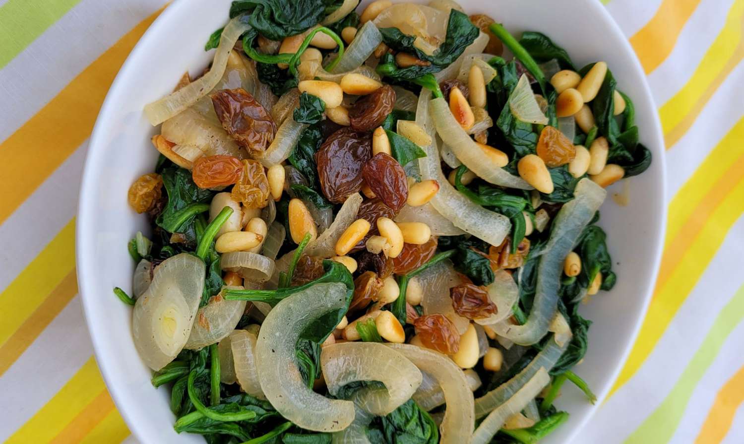 Sautéed Baby Kale with Caramelized Onions and Pine Nuts