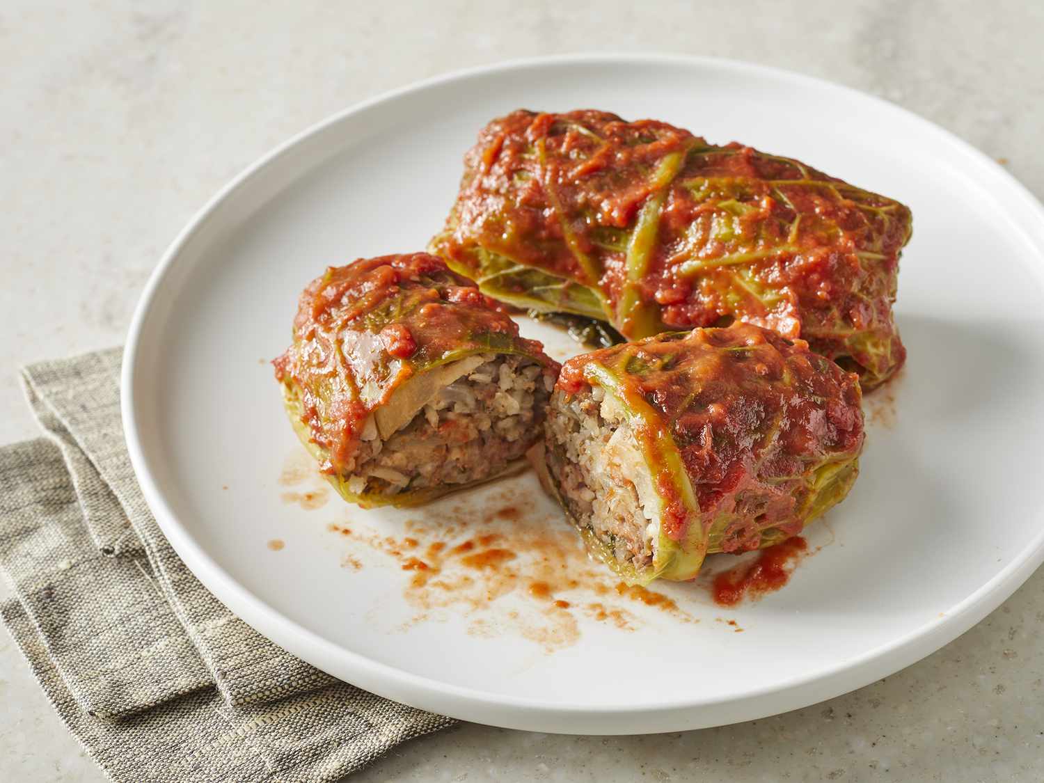 Savory Stuffed Cabbage Rolls with Meat and Tomato Sauce