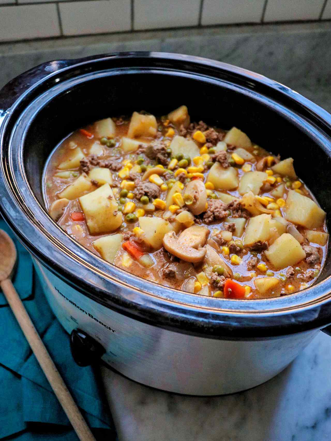 Slow Cooker Beef Stew with Biscuits and Cheddar