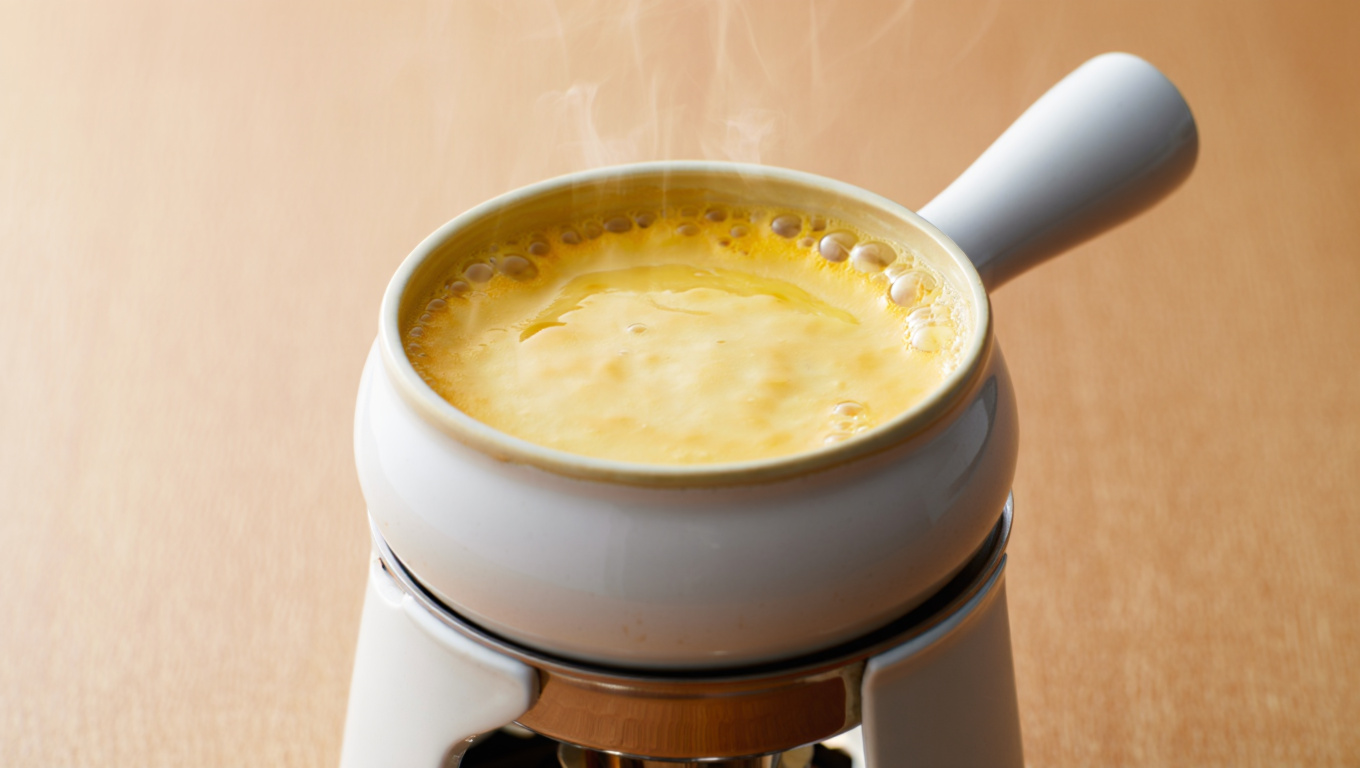 Three-Cheese Swiss Fondue with Gruyère, Cheddar, and Emmentaler